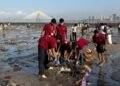 Students take up beach clean-up drives following Ganpati Visarjan in Mumbai